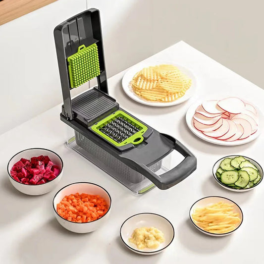 16-in-1 multifunctional chopper and slicer on a table with a variety of vegetables in bowls